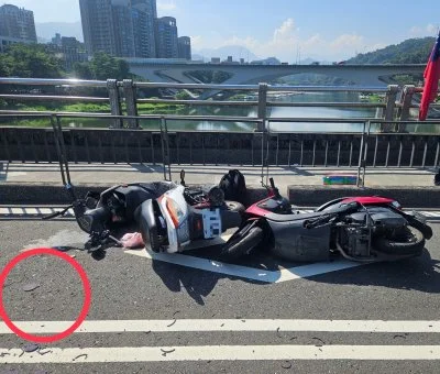 遭掉落蚊香打臉釀禍?新店區碧潭橋3輛車相撞 婦人摔車手腳擦挫傷